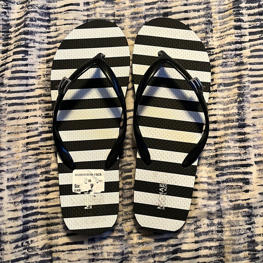 Michael Kors flip flops